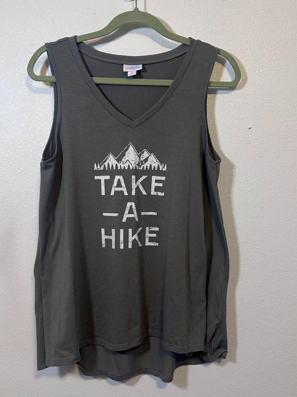 Gray LuLaRoe sleeveless tank with a white mountain graphic